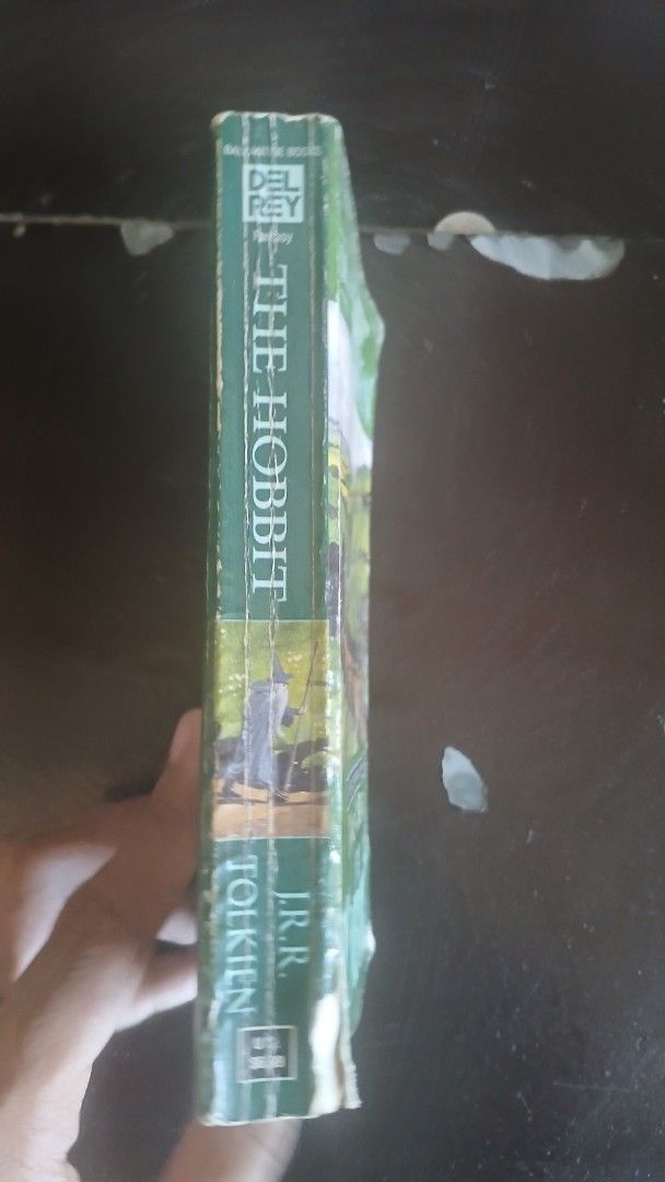 The Hobbit by J.R.R. Tolkien (Category: Storybooks) located in Muntinlupa City. Submitted by skramzgaze2005 (Listing ID 1437054649, Image 3). Description: - The Hobbit by J.R.R. Tolkien - Paperback edition - The enchanting prelude to The Lord of the Rings - Back cover mentions the upcoming movie trilogy from New Line Cinema - Perfect for fans and collectors!.