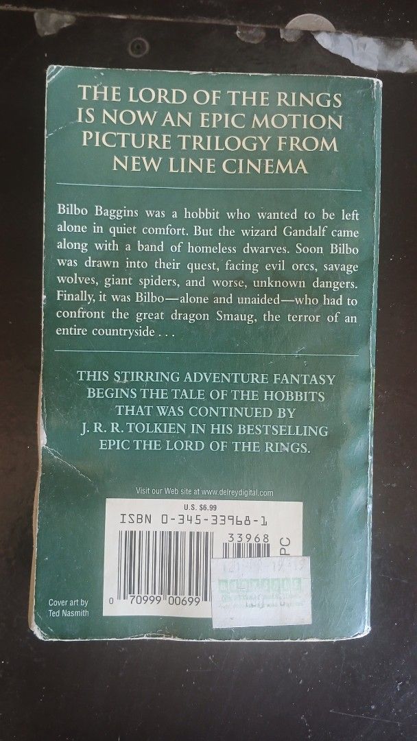 The Hobbit by J.R.R. Tolkien (Category: Storybooks) located in Muntinlupa City. Submitted by skramzgaze2005 (Listing ID 1437054649, Image 2). Description: - The Hobbit by J.R.R. Tolkien - Paperback edition - The enchanting prelude to The Lord of the Rings - Back cover mentions the upcoming movie trilogy from New Line Cinema - Perfect for fans and collectors!.