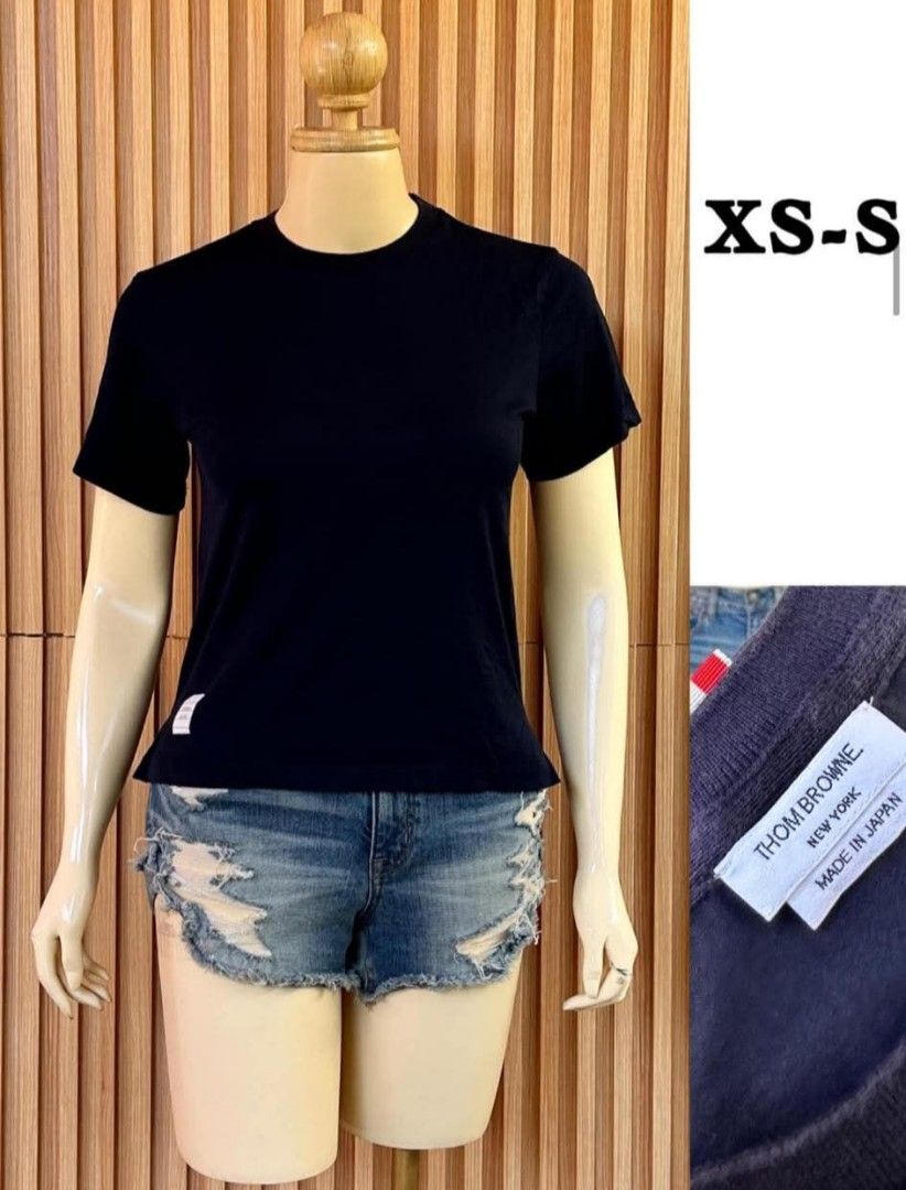 Thom Browne Navy T-shirt (Category: Tshirts & Polo Shirts ) located in Bangued. Submitted by lenc79928 (Listing ID 1437060305, Image 1). Description: - Authentic Thom Browne T-shirt - Navy color - Made in Japan - Size: XS-S (fits like) - Material: 100% cotton - Features: Crew neck, short sleeves - Includes Thom Browne New York label - Color Rate: 9/10.