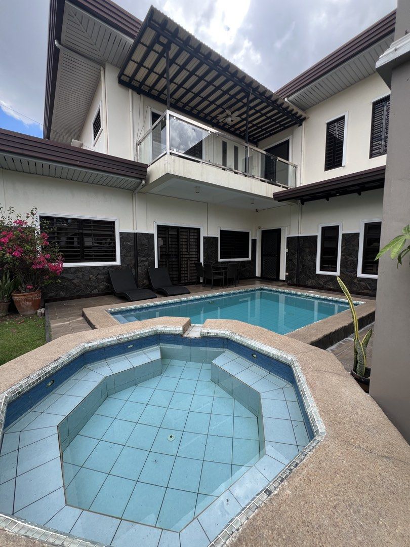 Two Storey house with spacious garden with pool 4br (Category: House & Lot) located in Angeles City. Submitted by dgr_realty (Listing ID 1437027443, Image 2). Description: 2 Storey House for Sale Angeles City, Pampanga Located in a gated subd with 24 hour security. Close to Clark. Few mins drive going Clark Airport, Malls, Hospitals Common Amenities: Swimming pool and Clubhouse for the residents. Price : P35.9M nego🎉 Lot area: 654sqm 4 Bedrooms 