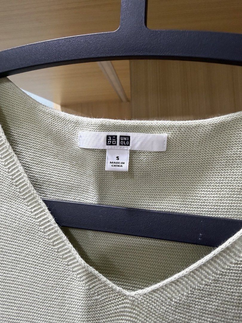 Uniqlo V-Neck Sweater (Category: Coats, Jackets and Outerwear) located in Mandaluyong City. Submitted by jpc0708 (Listing ID 1437133986, Image 2). Description: - Uniqlo V-neck sweater - Light green color - Size: S - Short sleeves - Ribbed texture - Made in China - Length: Approximately 23 inches.
