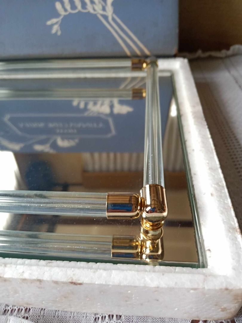 Vintage Avon Mirrored Vanity Makeup Tray (Category: Mirrors) located in Paranaque City. Submitted by amazingbarleybycherry-ph (Listing ID 1437172532, Image 2). Description: Vintage Avon Mirrored Vanity Makeup Tray 1,000.00 Clear glass frame with gold-colored accents Comes with original blue Avon box Dimension: 11” x 8” Imported from USA. Never been used. MOD: Direct pick-up or courier. MOP: Gcash, Bank deposit or cash. NO meet up. We're near LTO/