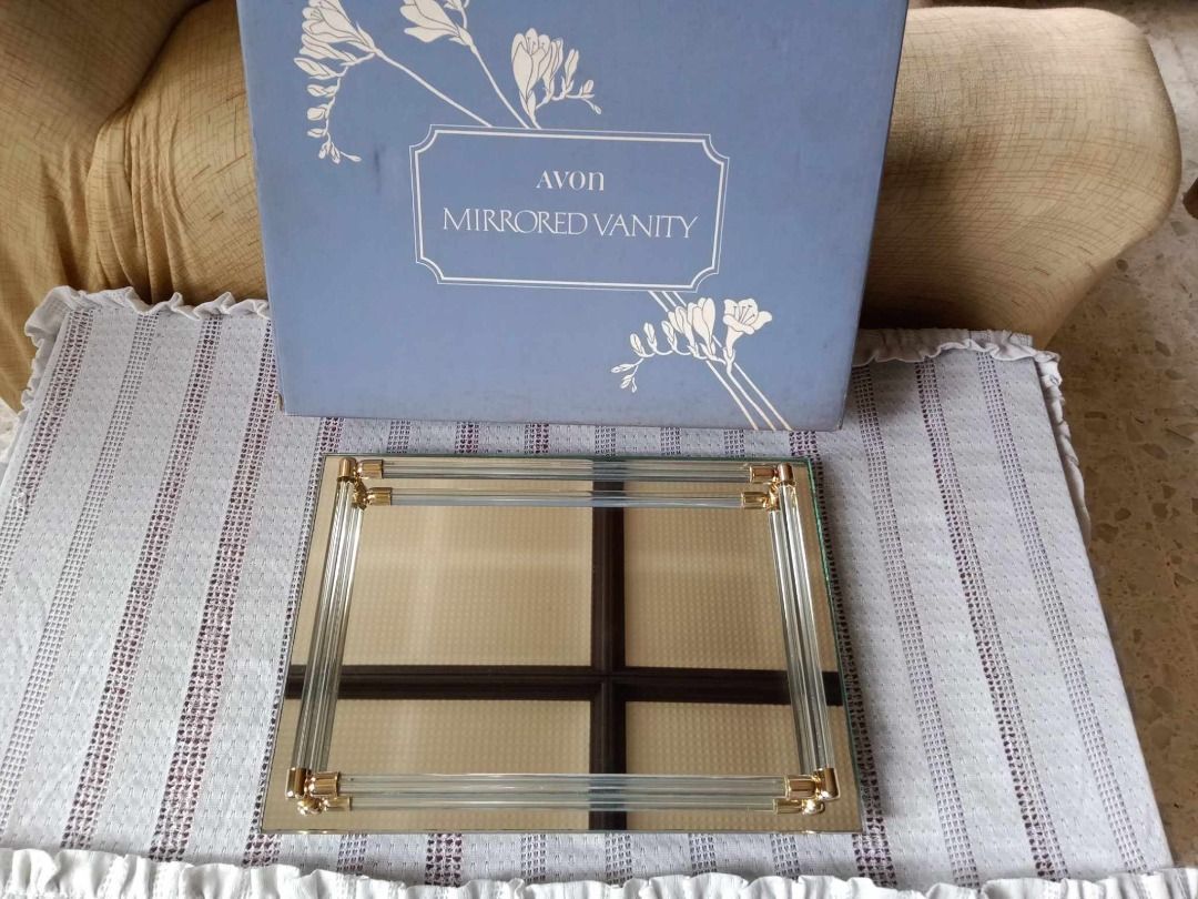 Vintage Avon Mirrored Vanity Makeup Tray (Category: Mirrors) located in Paranaque City. Submitted by amazingbarleybycherry-ph (Listing ID 1437172532, Image 1). Description: Vintage Avon Mirrored Vanity Makeup Tray 1,000.00 Clear glass frame with gold-colored accents Comes with original blue Avon box Dimension: 11” x 8” Imported from USA. Never been used. MOD: Direct pick-up or courier. MOP: Gcash, Bank deposit or cash. NO meet up. We're near LTO/