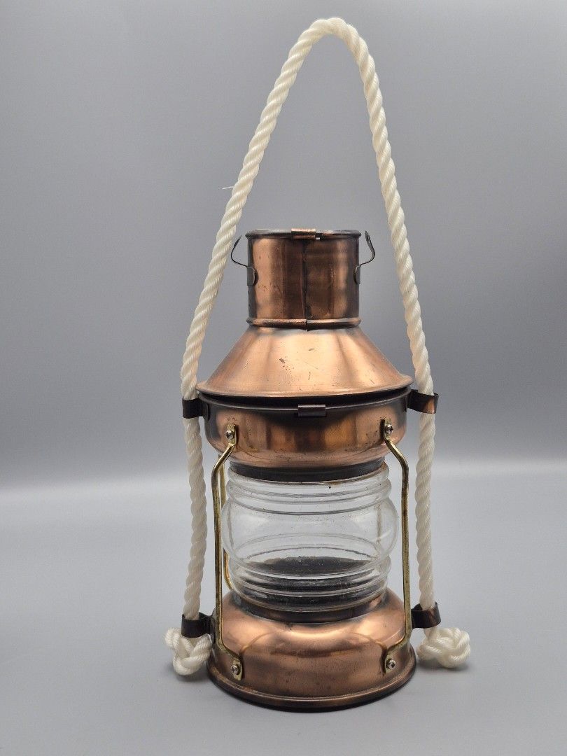 Vintage Copper Nautical Lantern Decor | Rustic Maritime Hanging Lamp (Category: Other Home Decor) located in Santa Rosa. Submitted by thesecondshelf (Listing ID 1437209779, Image 1). Description: Vintage Copper Nautical Lantern Decor | Rustic Maritime Hanging Lamp ₱550 Details: • Vintage-inspired copper nautical lantern decor • Features clear glass center and rope-style hanging handle • Beautiful rustic maritime look with warm copper finish • Lig