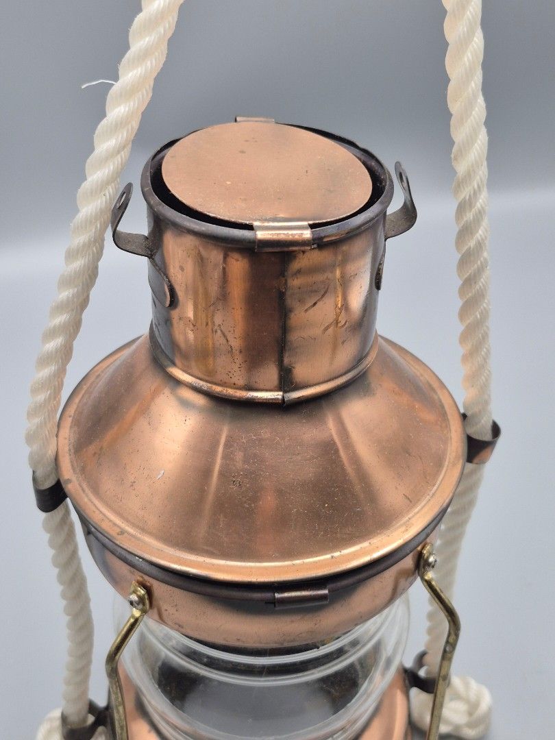 Vintage Copper Nautical Lantern Decor | Rustic Maritime Hanging Lamp (Category: Other Home Decor) located in Santa Rosa. Submitted by thesecondshelf (Listing ID 1437209779, Image 2). Description: Vintage Copper Nautical Lantern Decor | Rustic Maritime Hanging Lamp ₱550 Details: • Vintage-inspired copper nautical lantern decor • Features clear glass center and rope-style hanging handle • Beautiful rustic maritime look with warm copper finish • Lig