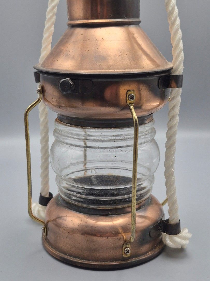 Vintage Copper Nautical Lantern Decor | Rustic Maritime Hanging Lamp (Category: Other Home Decor) located in Santa Rosa. Submitted by thesecondshelf (Listing ID 1437209779, Image 3). Description: Vintage Copper Nautical Lantern Decor | Rustic Maritime Hanging Lamp ₱550 Details: • Vintage-inspired copper nautical lantern decor • Features clear glass center and rope-style hanging handle • Beautiful rustic maritime look with warm copper finish • Lig