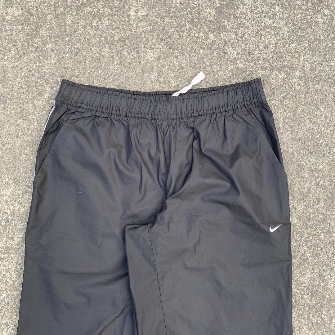 Vintage Nike Track Pants white (Category: Activewear) located in Tanza. Submitted by holy.thrift (Listing ID 1437024496, Image 3). Description: Vintage Nike Track Pants white SIZE: SMALL DIMES: W - 30-32 L - 38 Leg Opening - 12 HEM - 10.5 NO ISSUE COMPLETE TAGS CONDITION: 10/10 COLOR RATE: 10/10.