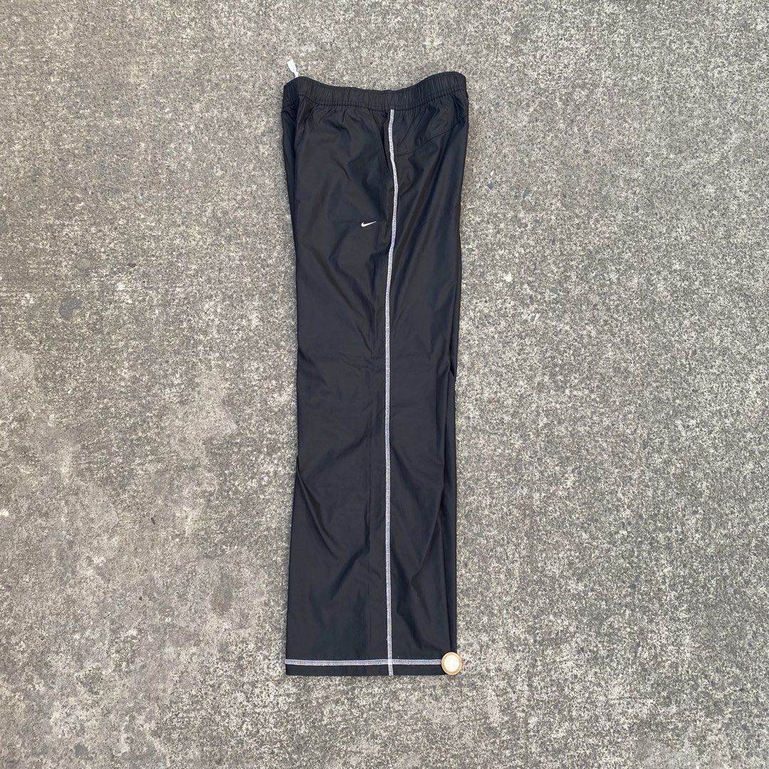 Vintage Nike Track Pants white (Category: Activewear) located in Tanza. Submitted by holy.thrift (Listing ID 1437024496, Image 1). Description: Vintage Nike Track Pants white SIZE: SMALL DIMES: W - 30-32 L - 38 Leg Opening - 12 HEM - 10.5 NO ISSUE COMPLETE TAGS CONDITION: 10/10 COLOR RATE: 10/10.