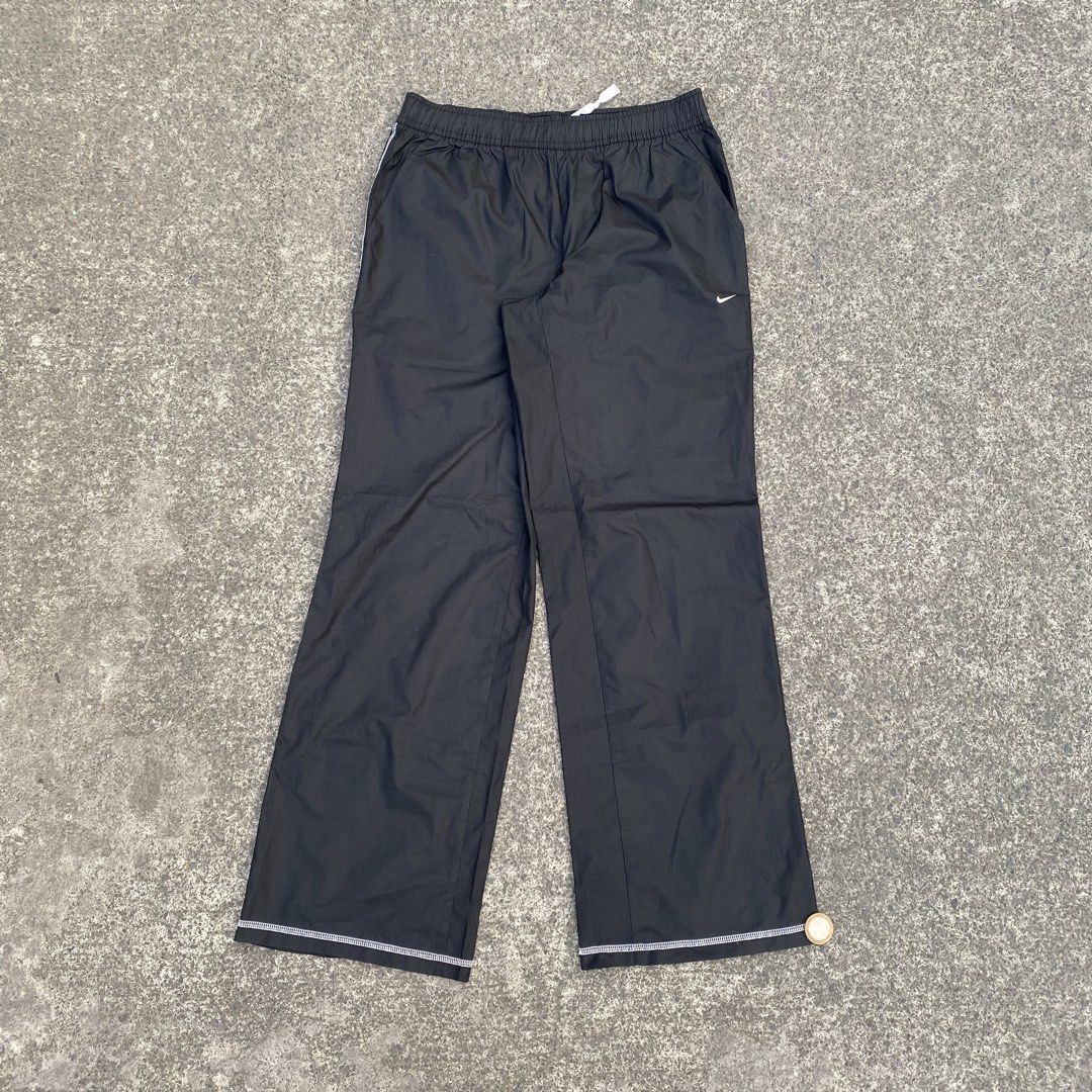 Vintage Nike Track Pants white (Category: Activewear) located in Tanza. Submitted by holy.thrift (Listing ID 1437024496, Image 2). Description: Vintage Nike Track Pants white SIZE: SMALL DIMES: W - 30-32 L - 38 Leg Opening - 12 HEM - 10.5 NO ISSUE COMPLETE TAGS CONDITION: 10/10 COLOR RATE: 10/10.