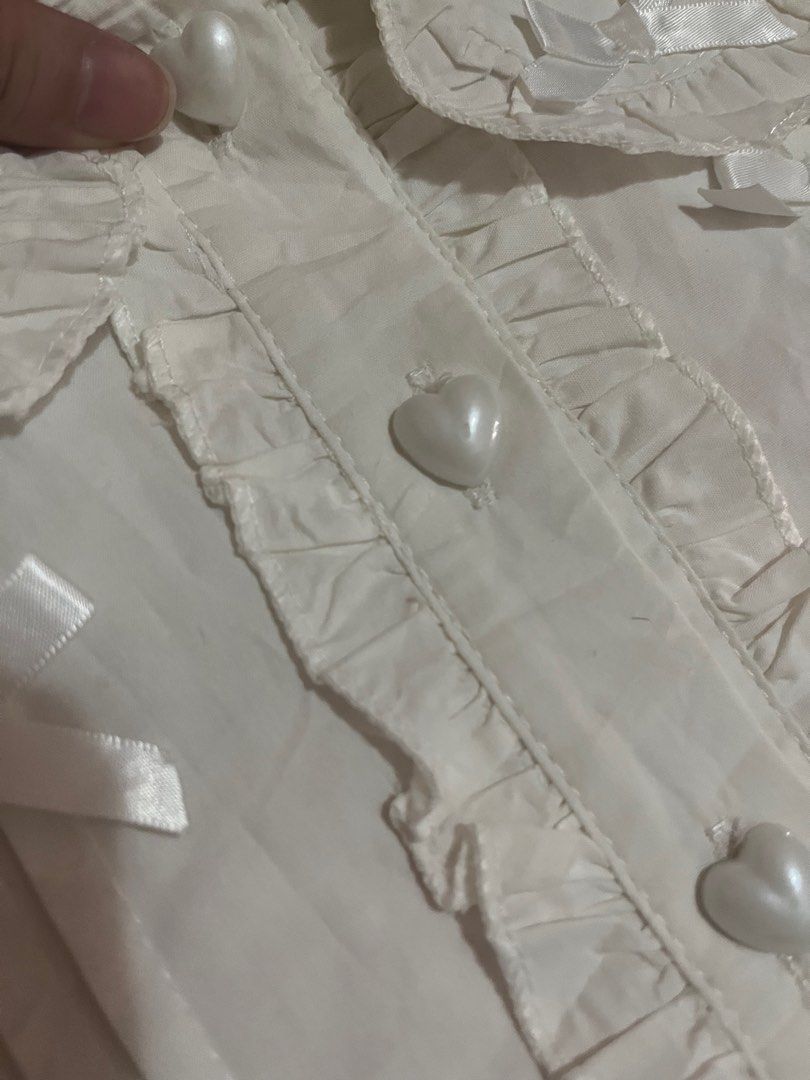 White Coquette Polo Ruffles Top Blouse (Category: Blouses) located in Santa Rosa. Submitted by czescakeeee (Listing ID 1437095230, Image 3). Description: SUPER CUTIE!!!! .