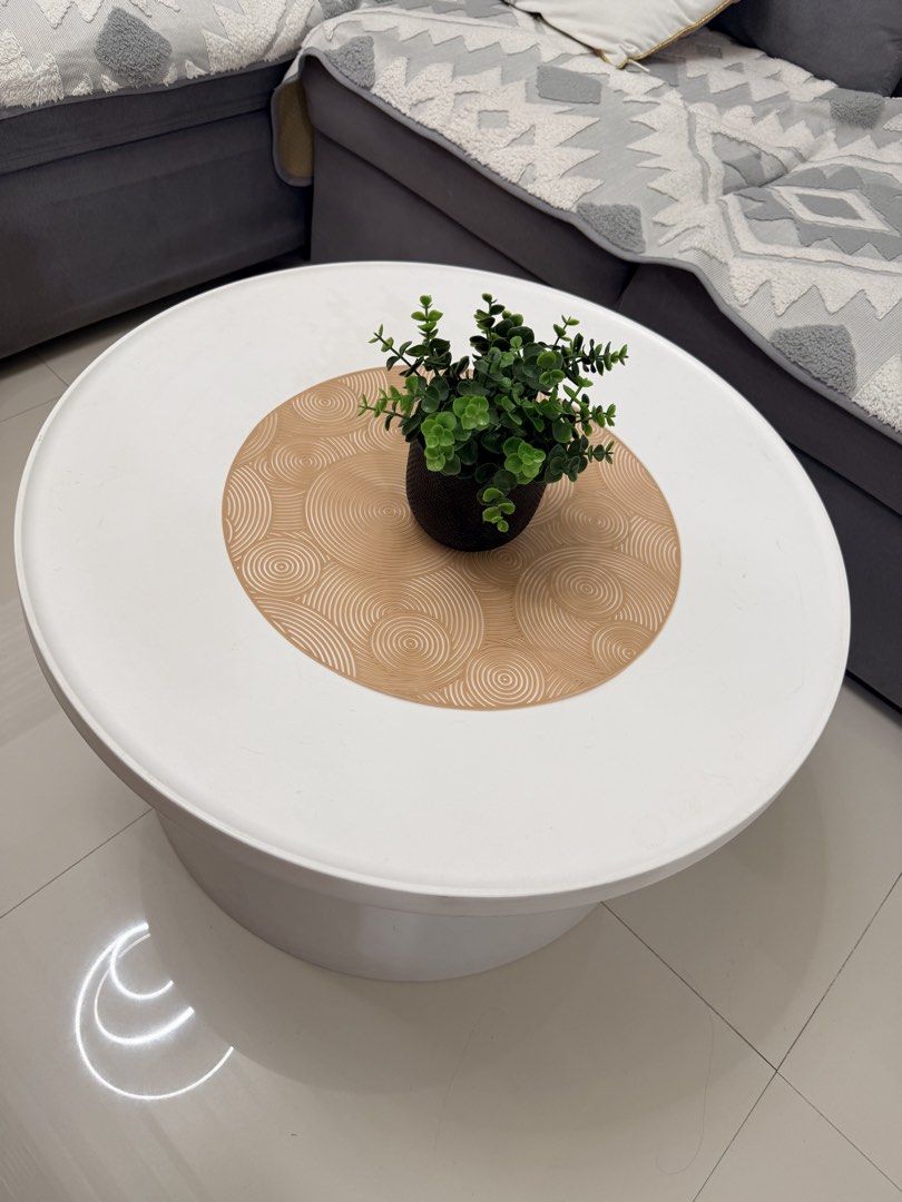 White Round Coffee Table (Category: Tables & Sets) located in Batangas. Submitted by belaluz09 (Listing ID 1437102888, Image 3). Description: - Round coffee table - White base and top - Sturdy and modern design - Ideal for living rooms and lounges Hard plastic 26 inches please see photos to appreciate Location 📍Batangas City/ Pasig payment: COD via lalamove BDO or Gcash.