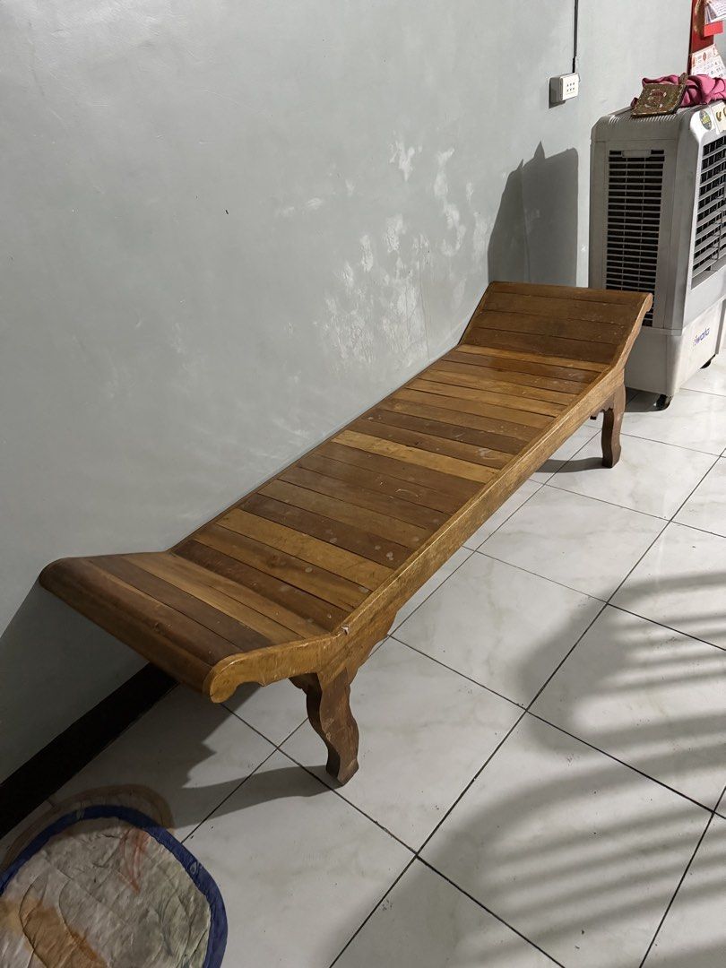 Wooden Bench (Category: Chairs) located in Navotas City. Submitted by ninaasaurus2 (Listing ID 1437083920, Image 3). Description: - Wooden bench - Curved design - Slatted seat - Decorative legs - Natural wood finish - Sturdy construction - NO ISSUES RFS: house is already cramped. Decluttering.