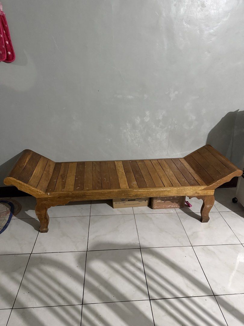 Wooden Bench (Category: Chairs) located in Navotas City. Submitted by ninaasaurus2 (Listing ID 1437083920, Image 1). Description: - Wooden bench - Curved design - Slatted seat - Decorative legs - Natural wood finish - Sturdy construction - NO ISSUES RFS: house is already cramped. Decluttering.
