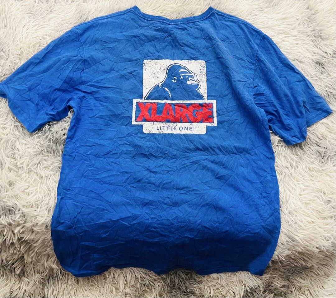 XLARGE Disney Mickey Mouse T-shirt (Category: Tshirts & Polo Shirts ) located in Manila. Submitted by zealocean.1db413 (Listing ID 1437035274, Image 1). Description: - Blue XLARGE T-shirt - Features a Mickey Mouse graphic on the front - Disney logo on the sleeve - XLARGE logo with gorilla graphic on the back - Crew neck - Short sleeves.