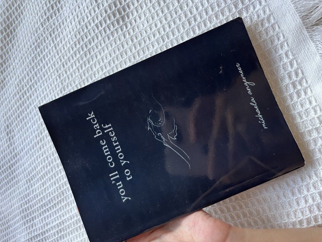 You'll Come Back to Yourself by Michaela Angemeer (Category: Storybooks) located in Quezon City. Submitted by declutter_xo (Listing ID 1437142576, Image 1). Description: - "You'll Come Back to Yourself" by Michaela Angemeer - Poetry and prose collection - Black cover with white text and simple illustration - Back cover question: "Can you let go of someone without forgetting how they made you feel?".