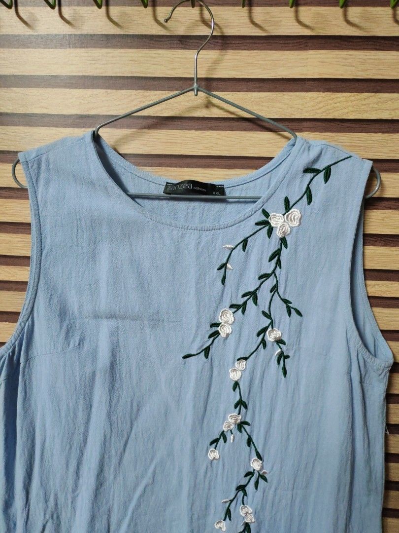 Zanzea Embroidered Sleeveless Top (Category: Sleeveless) located in Makati City. Submitted by mybentables (Listing ID 1437160040, Image 3). Description: - Zanzea light blue sleeveless top - Embroidered floral design - Round neckline - Size: XXL.