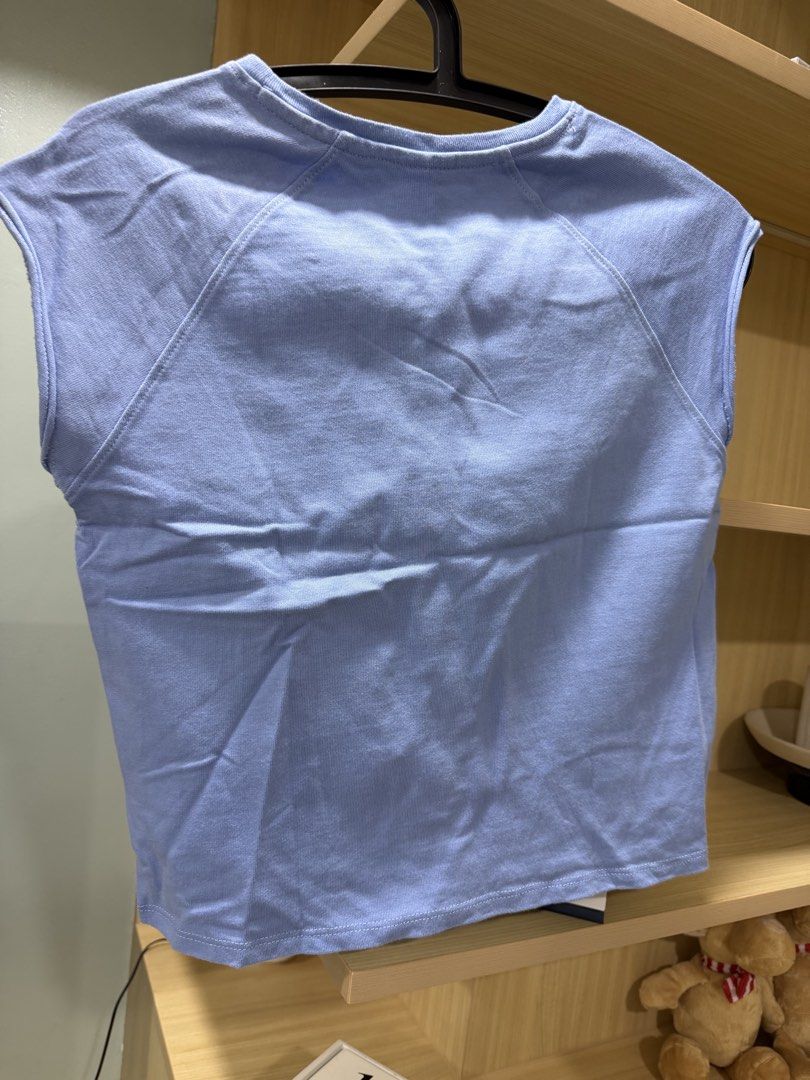 Zara Blue Top (Category: Babies & Kids Fashion) located in Mandaluyong City. Submitted by jpc0708 (Listing ID 1437132418, Image 3). Description: - Zara crop top in a lovely blue color - Size: Fits ages 13-14 (164cm height) - Measurements: Approximately 19 inches long, 16 inches across the chest - Features: Round neck and cap sleeves - Simple and stylish design.