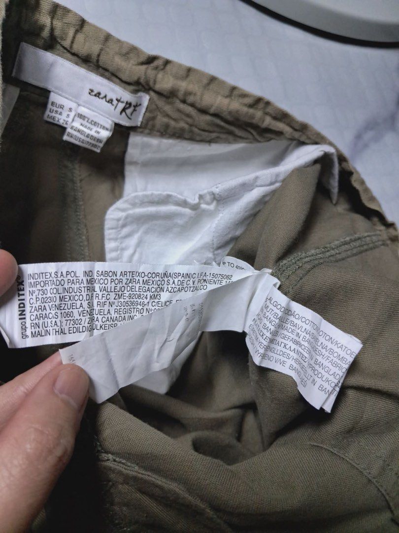 Zara TRF Small Olive Green Cropped Pants (Category: Other Bottoms) located in Baguio. Submitted by padisellsz (Listing ID 1437124097, Image 3). Description: - Zara TRF olive green pants - Very good condition - No issues - Size: Small - Features: - Drawstring waist - Ankle tie details - Two front pockets - One back pocket - Material: 100% cotton - Size details: EUR S, USA S, MEX 26 - Made in Bangladesh.