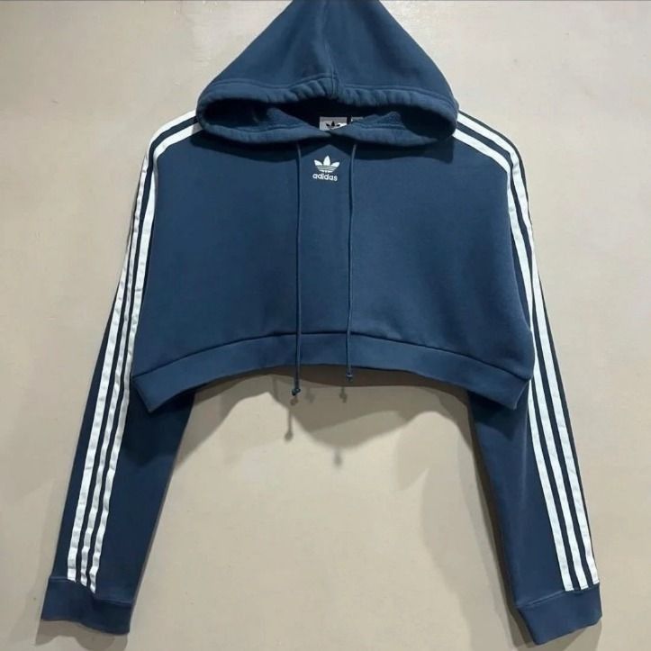 Adidas Cropped Sweater Hoodie (Category: Coats, Jackets and Outerwear) located in Manila. Submitted by couture_cache (Listing ID 1437286134, Image 2). Description: Reworked, hindi halata. May sign of use and since used, manage your expectation. Dimension Width: 23 Inches Length: 13 Inches First to pay basis and payment first. Delivery shouldered by buyer: Lalamove, J&T, or Flash Express. No rush shipping. Location: Taytay, Rizal.