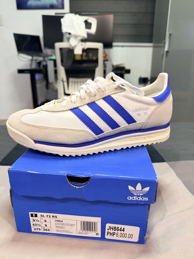 Adidas SL 72 RS - White and Blue (Category: Sneakers) located in Imus. Submitted by ojae.ramos-04604 (Listing ID 1437297449, Image 1). Description: FOR SALE: Adidas SL 72 RS Classic retro style with a clean blue & white colorway — perfect for everyday wear or casual fits. Worn only a once and still in excellent condition (like bnew) see photos 👟 Size: US 9.5 / 275mm 💰 Selling Price: ₱4,500 only (originally ₱6,000) 📦 With original box ✅ Excelle
