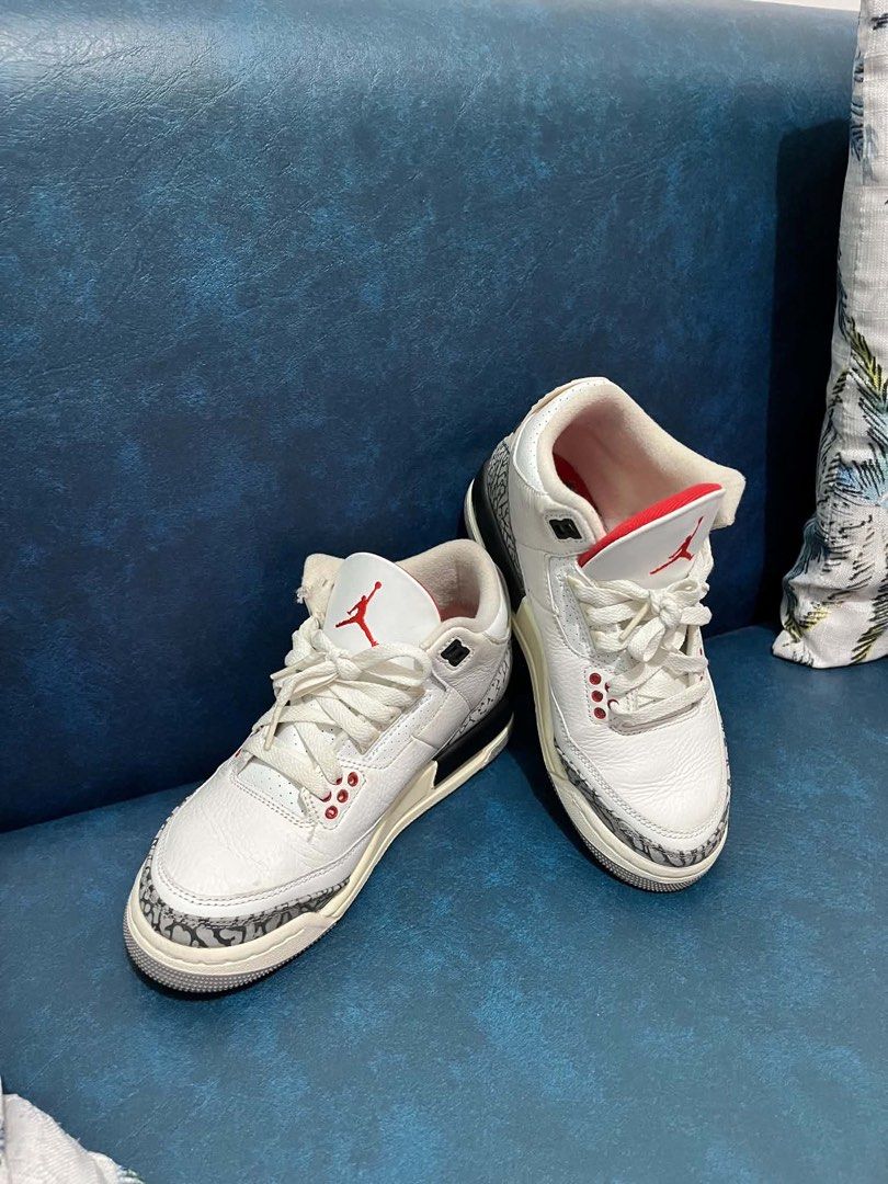 Air Jordan 3 Retro White Cement (Category: Sneakers) located in San Pedro. Submitted by kaassy (Listing ID 1437325285, Image 2). Description: Classic Air Jordan 3 Retro sneakers in white with cement grey accents. Features the iconic elephant print on the toe and heel. Includes red Jumpman logo on the tongue. The midsole has a cream color. The laces are white. The outsole is grey..