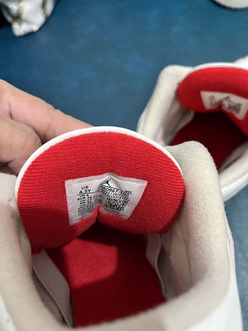 Air Jordan 3 Retro White Cement (Category: Sneakers) located in San Pedro. Submitted by kaassy (Listing ID 1437325285, Image 3). Description: Classic Air Jordan 3 Retro sneakers in white with cement grey accents. Features the iconic elephant print on the toe and heel. Includes red Jumpman logo on the tongue. The midsole has a cream color. The laces are white. The outsole is grey..