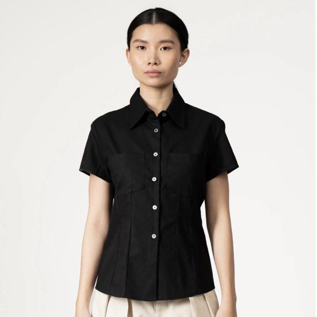 Apara Short Sleeve Button Down Polo in Black (Category: Blouses) located in Cainta. Submitted by softaschalk (Listing ID 1437220063, Image 1). Description: Size small Rfs: don’t like the fit on me Never worn, original price 4,200 Photos from their ig! Can send actual photos via dm.