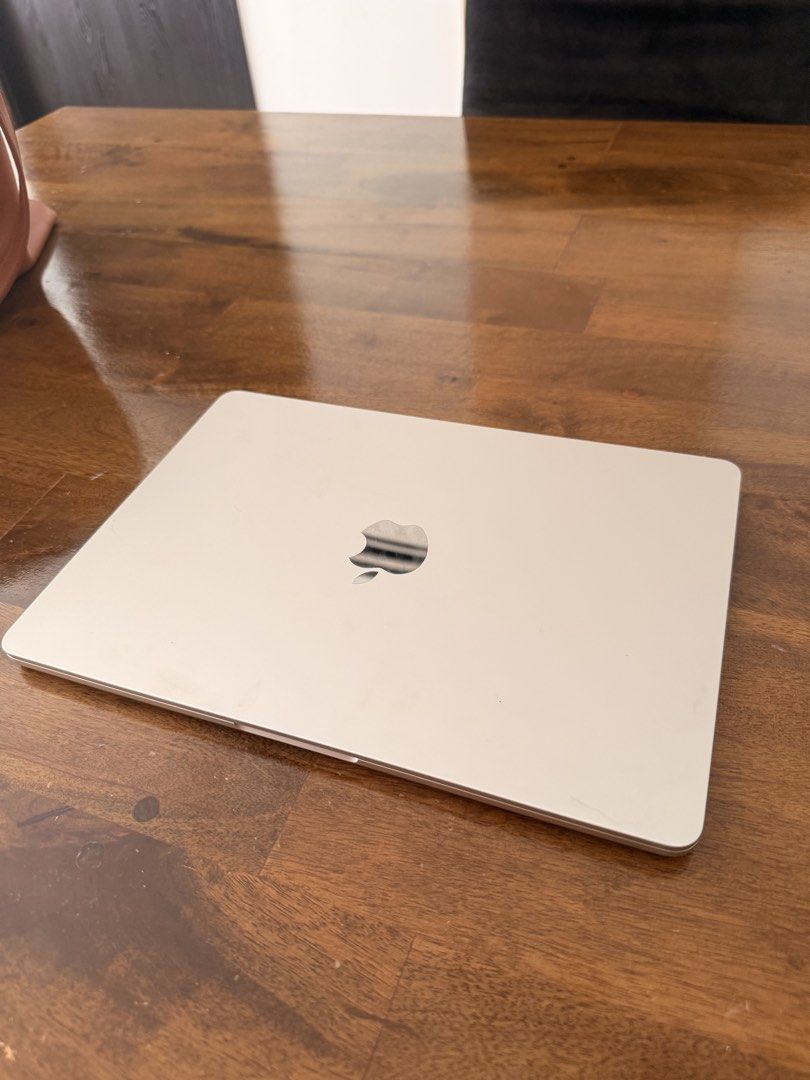 Apple Macbook Air M2 2022 (Category: Laptops & Notebooks) located in Taguig. Submitted by samlibao (Listing ID 1437367048, Image 2). Description: Apple Macbook Air M2 2022 model. Features an Apple M2 chip, 8GB memory, and a 256GB storage. The battery health is at 98%. Cycle count is 100. It has a 13.6-inch Liquid Retina display. Running on macOS Sequoia version 15.0.1. The laptop is in perfect working condition..