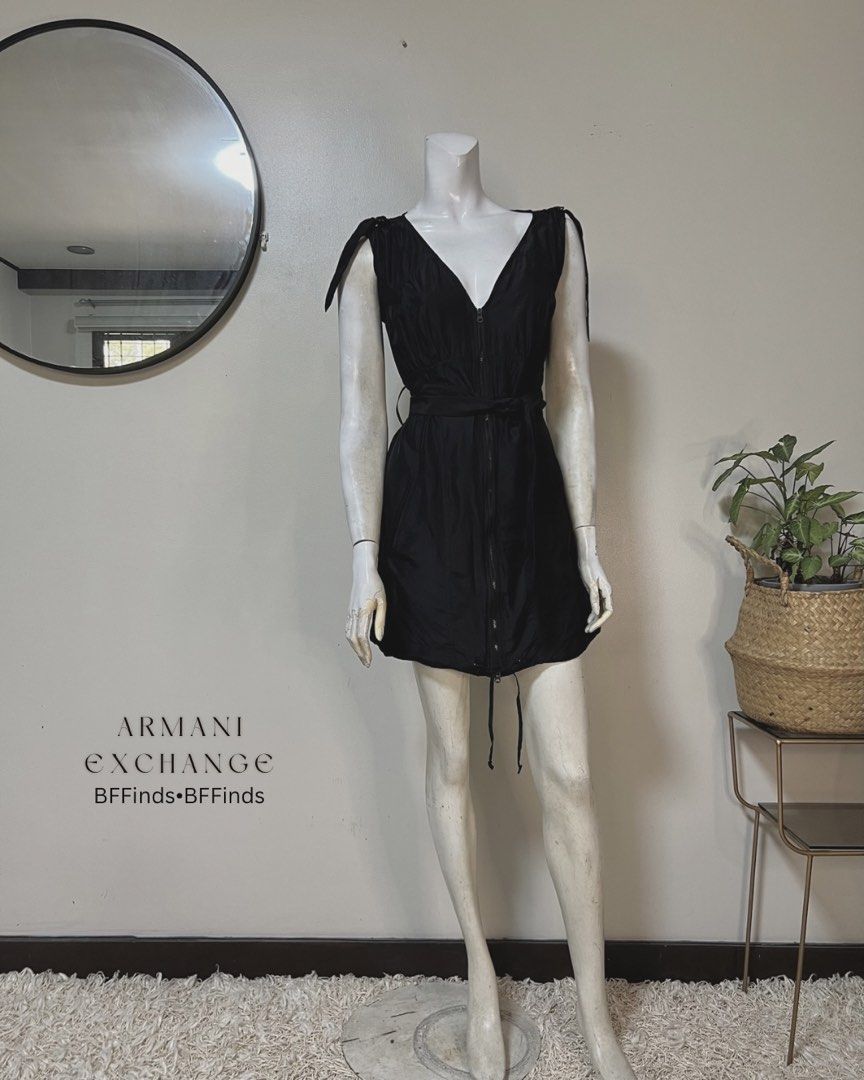 Armani Exchange Front Zip Black Mini Dress (Category: Dresses) located in Muntinlupa City. Submitted by bff_findsph (Listing ID 1437344347, Image 1). Description: A|X Front Zip Black Mini Dress | ₱1,200 Effortlessly versatile. Wear it with heels for a polished look or sneakers for a casual . Designed with adjustable straps and a drawstring hem for a flattering, modern fit. Fabric | 100% Silk Guaranteed Authentic Size | Medium Measurements Bust |3