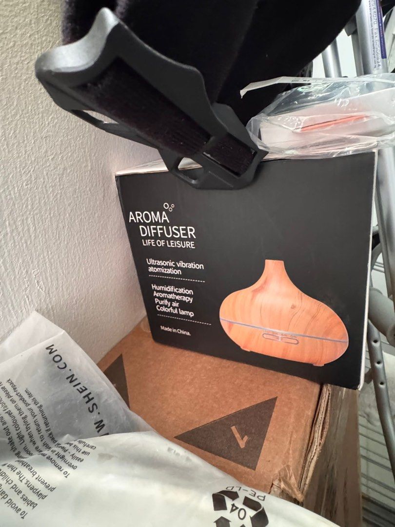 Aroma Diffuser (Category: Home Fragrance) located in Singapore. Submitted by alphaq69 (Listing ID 1437343111, Image 2). Description: - Features: - Humidification - Aromatherapy - Perfect for creating a relaxing atmosphere. - Comes in original packaging..