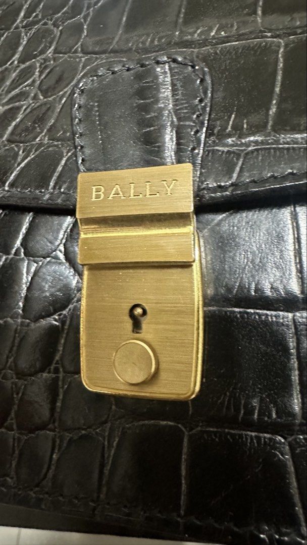 Authentic Bally Clutch (Category: Luxury Bags & Wallets) located in Las Pinas. Submitted by marshmallowmax (Listing ID 1437237532, Image 2). Description: Guaranteed Authentic! Tag and dustbag Med size L-9.5 x H-6.5”.