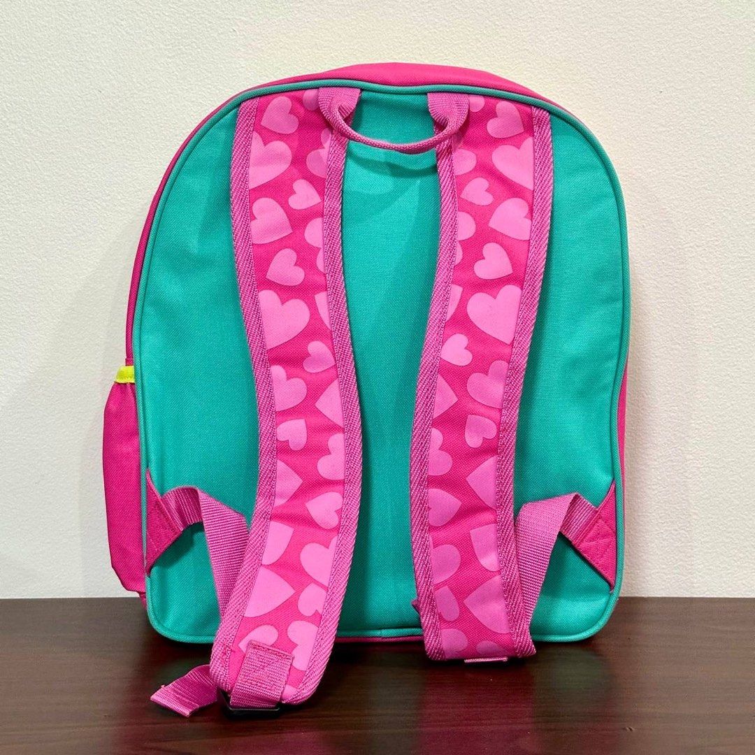 [Authentic] Crocodile Creek Go Kids Dog Backpack (Category: Babies & Kids Fashion) located in Quezon City. Submitted by brandedusagoodies (Listing ID 1437386933, Image 3). Description: Adorable Crocodile Creek kid-sized backpack featuring a cute puppy character design with colorful heart patterns and bright contrast details. Lightweight and practical for school, daycare, travel, or everyday essentials for kids. Material – Polyester Fabric Color /