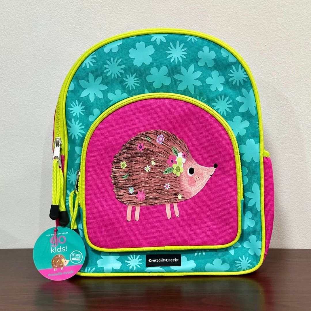 [Authentic] Crocodile Creek Go Kids Hedgehog Backpack (Category: Babies & Kids Fashion) located in Quezon City. Submitted by brandedusagoodies (Listing ID 1437387545, Image 1). Description: Adorable Crocodile Creek kid-sized backpack featuring a cute floral hedgehog design in vibrant pink and teal colors. Lightweight and functional, this backpack is perfect for preschool, daycare, travel, and everyday adventures for little kids. Material – Polyes