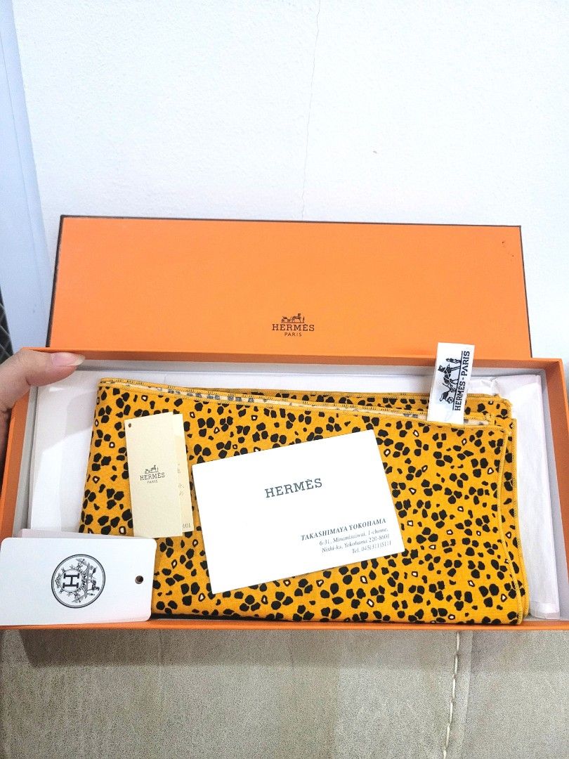 Authentic Hermes Scarf or Hanky (Category: Scarves) located in Antipolo. Submitted by dlolin (Listing ID 1437366836, Image 1). Description: - Guaranteed Authentic Hermes scarf - Vibrant yellow and black pattern - Includes original box - Comes with tags and paperwork - Neatly folded inside the box - Features the Hermes logo - A classic luxury accessory.