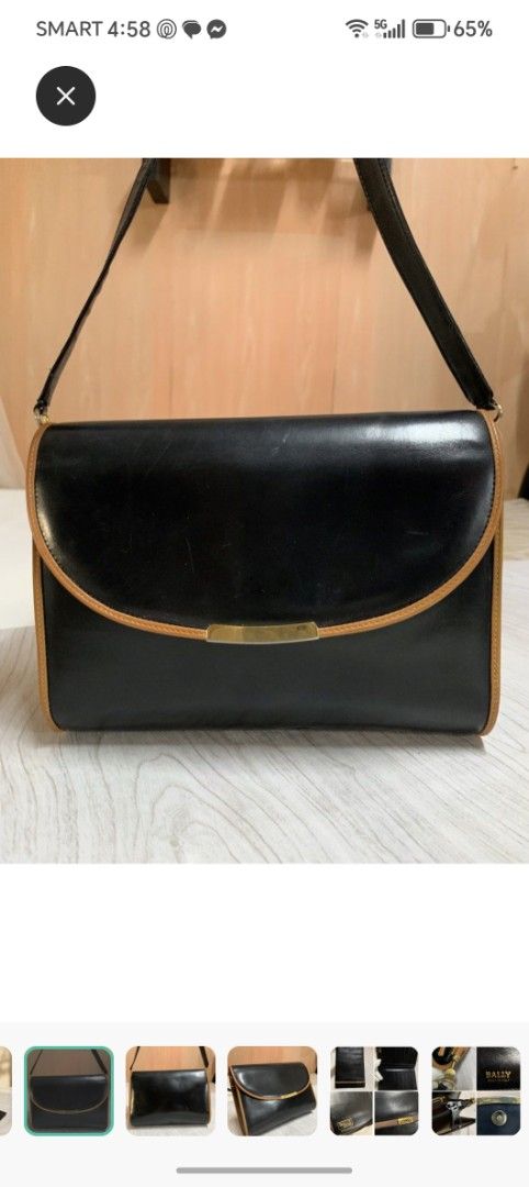 Bally Black Leather Shoulder Bag (Category: Luxury Bags & Wallets) located in Makati City. Submitted by brooklyn87370 (Listing ID 1437400175, Image 2). Description: - Bally shoulder bag - Black leather with tan trim - Gold-tone clasp and hardware - Long shoulder strap - Flap closure - Made in Italy.