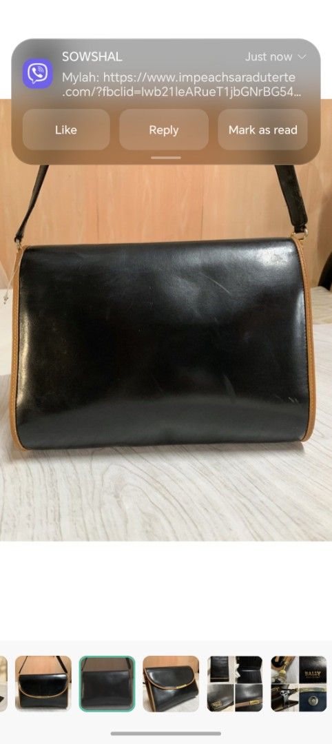 Bally Black Leather Shoulder Bag (Category: Luxury Bags & Wallets) located in Makati City. Submitted by brooklyn87370 (Listing ID 1437400175, Image 3). Description: - Bally shoulder bag - Black leather with tan trim - Gold-tone clasp and hardware - Long shoulder strap - Flap closure - Made in Italy.