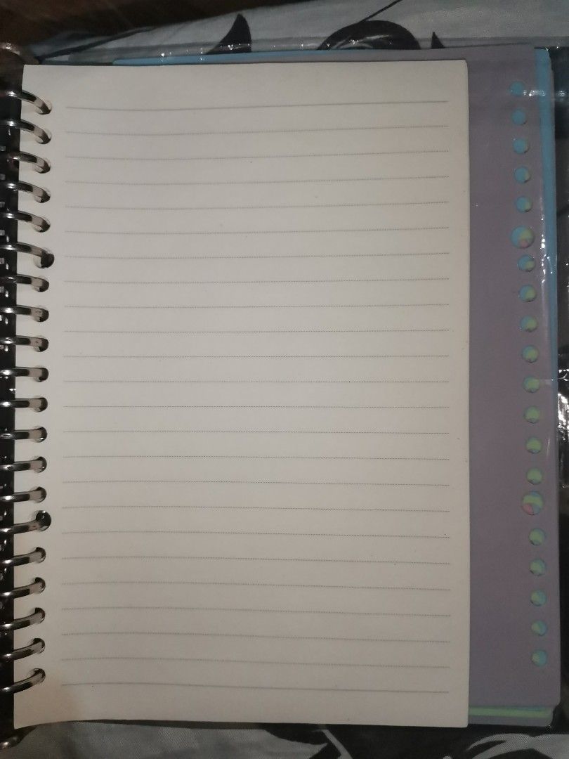 B&E A5 Binder Notebook Divider (Category: Stationery & School Supplies) located in Rodriguez. Submitted by johnpatrickzxc (Listing ID 1437344475, Image 2). Description: - A5 Binder Notebook - 20 Holes - Includes 9 Dividers - Size: 145mm x 210mm - Lined Paper - Spiral Binding - Free included papers - Used twice .