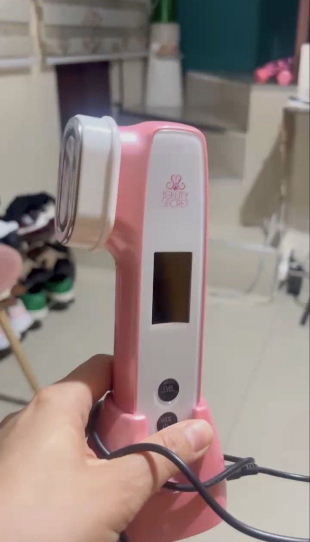 Beauty Secret 6-in-1 Portable Multi-Function RF/EMS Device (Category: Face Care) located in Paranaque City. Submitted by abbysen.creactivatio554 (Listing ID 1437271009, Image 2). Description: - Beauty Secret 6-in-1 device for elastic, youthful skin. - Features 7 skin-enhancing technologies. - Offers 6 function modes: eye care, deep cleaning, skin rejuvenation, and more. - Stylish pink and white design. - Includes a convenient charging base. - Eas