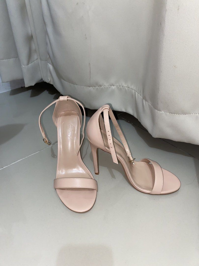 Beige/Nude Stiletto Heels Size 39 (Category: Heels) located in Quezon City. Submitted by loverynn (Listing ID 1437247977, Image 1). Description: • Size: EU 39 (24.84cm) • Heel length: 4.5 inches • Like new: Used only twice to fit indoors • Small flaking in strap of right heel • No box but packed securely .