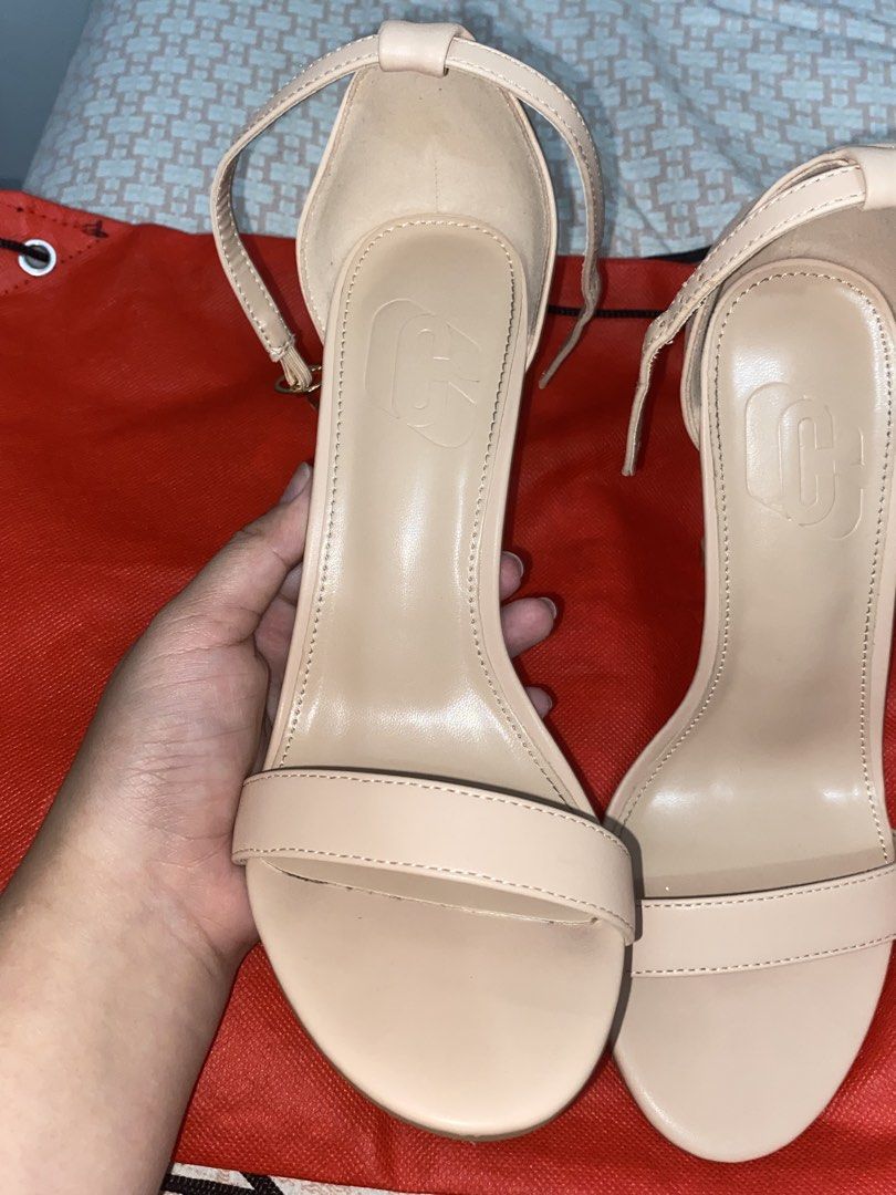 Beige/Nude Stiletto Heels Size 39 (Category: Heels) located in Quezon City. Submitted by loverynn (Listing ID 1437247977, Image 3). Description: • Size: EU 39 (24.84cm) • Heel length: 4.5 inches • Like new: Used only twice to fit indoors • Small flaking in strap of right heel • No box but packed securely .