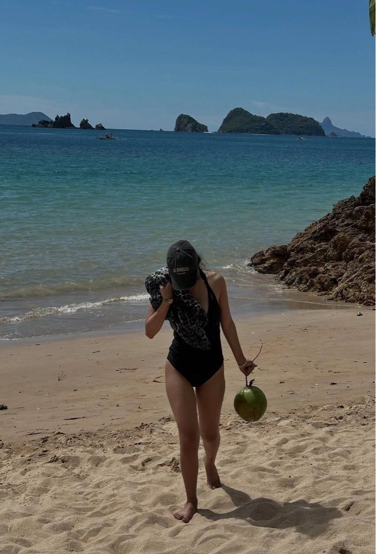 Black One-Piece Swimsuit (Category: Bikinis & Swimsuits) located in Dasmarinas. Submitted by sandyaaa_22 (Listing ID 1437373074, Image 1). Description: - Black one-piece swimsuit - Halter neck design - Low back - Tie detail at the back - Smooth, solid fabric - Ideal for beach and pool wear -fit to medium to large -worn once.