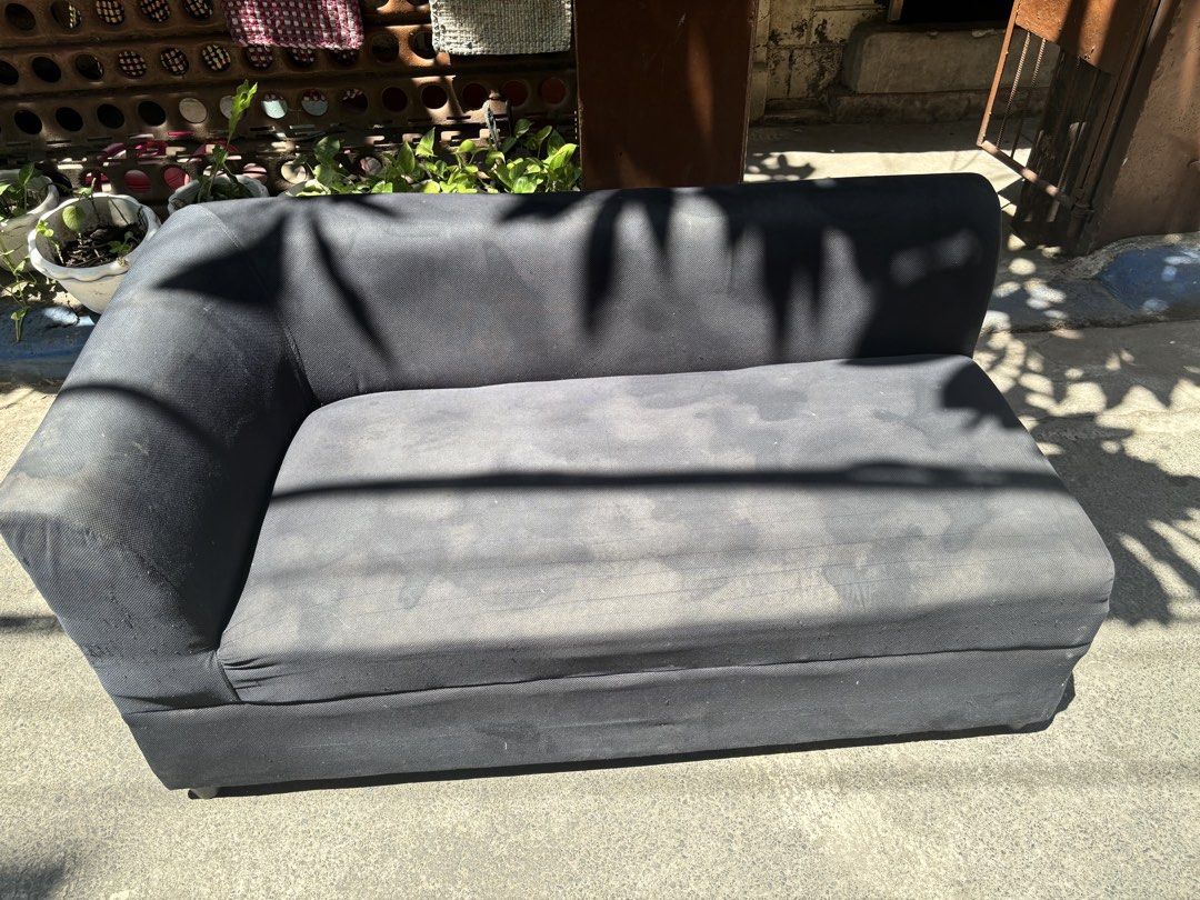 Black Sectional Sofa (Category: Sofas) located in Manila. Submitted by pandesal1021 (Listing ID 1437258731, Image 3). Description: - Black sectional sofa - Single armrest on the left - Rectangular shape - Cushioned seat and back - Soft, possibly velvet-like material.