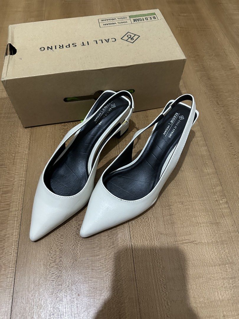 Call It Spring Rozalia White Block Heel Shoes (Category: Heels) located in Pasig City. Submitted by _kukustuff (Listing ID 1437238884, Image 2). Description: - Size: US 6, UK 3, Euro 36 - Pointed toe, slingback strap - Includes original box - Sold out online but similar style goes for ₱2995 in Zalora - Condition: Minor marks.