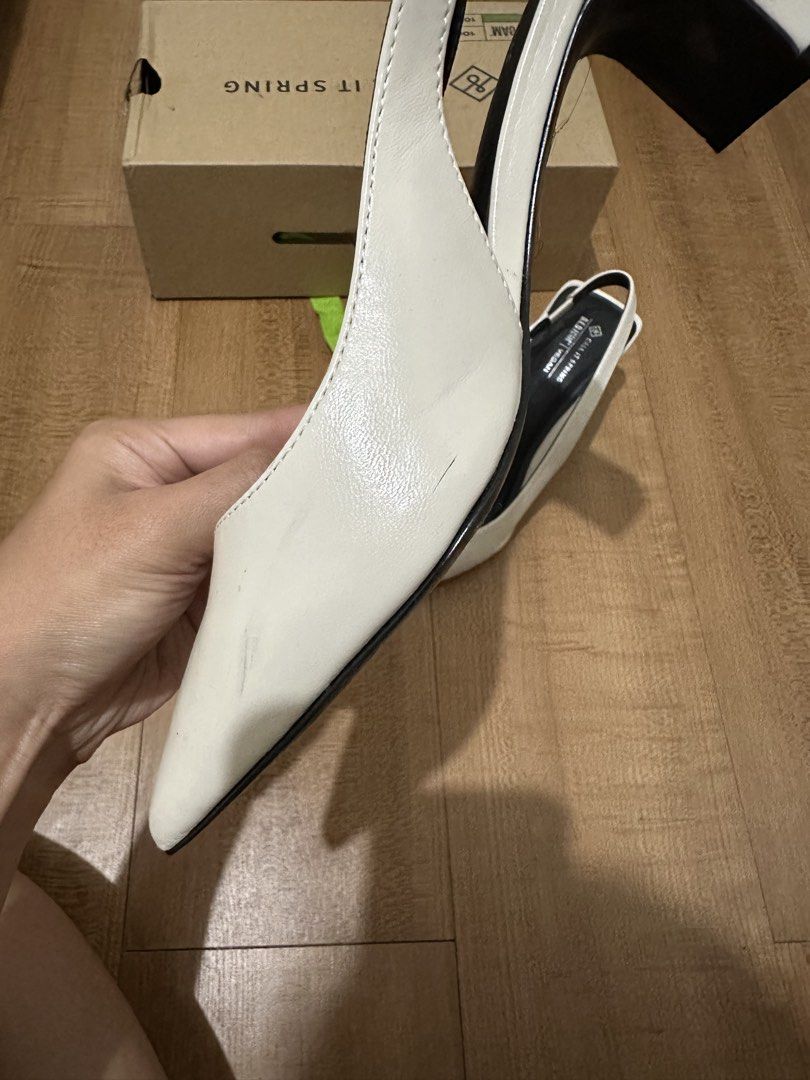 Call It Spring Rozalia White Block Heel Shoes (Category: Heels) located in Pasig City. Submitted by _kukustuff (Listing ID 1437238884, Image 3). Description: - Size: US 6, UK 3, Euro 36 - Pointed toe, slingback strap - Includes original box - Sold out online but similar style goes for ₱2995 in Zalora - Condition: Minor marks.