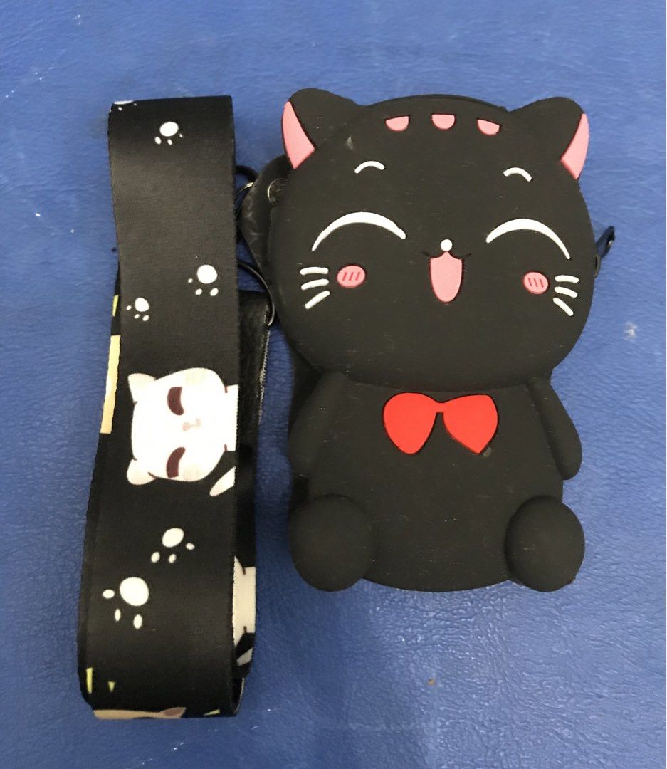 Cat coin purse w/ strap (Category: Everything Else Others) located in Quezon City. Submitted by 79moving (Listing ID 1437399554, Image 1). Description: .