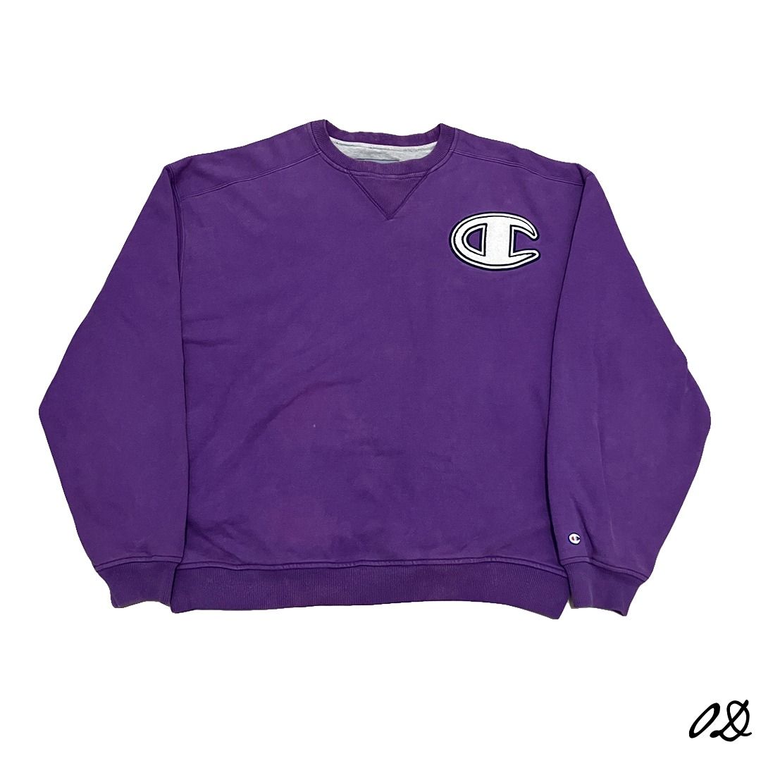 Champion Early 2000s Purple Sweatshirt (Category: Coats, Jackets and Outerwear) located in Manila. Submitted by own.desire (Listing ID 1437390467, Image 1). Description: Champion Early 2000s Purple Sweatshirt Size on tag: XXL *Size on tape Width: 27" Length: 29" Flaws: none Price: 980.