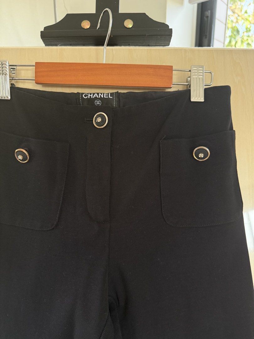 Chanel Black Pants (Category: Luxury Apparel) located in Paranaque City. Submitted by acrossthe.universe (Listing ID 1437296930, Image 2). Description: - Chanel black pants - Classic design - Two front pockets - Decorative buttons - Chanel logo on waistband - Tailored fit - Suitable for various occasions - Timeless piece.