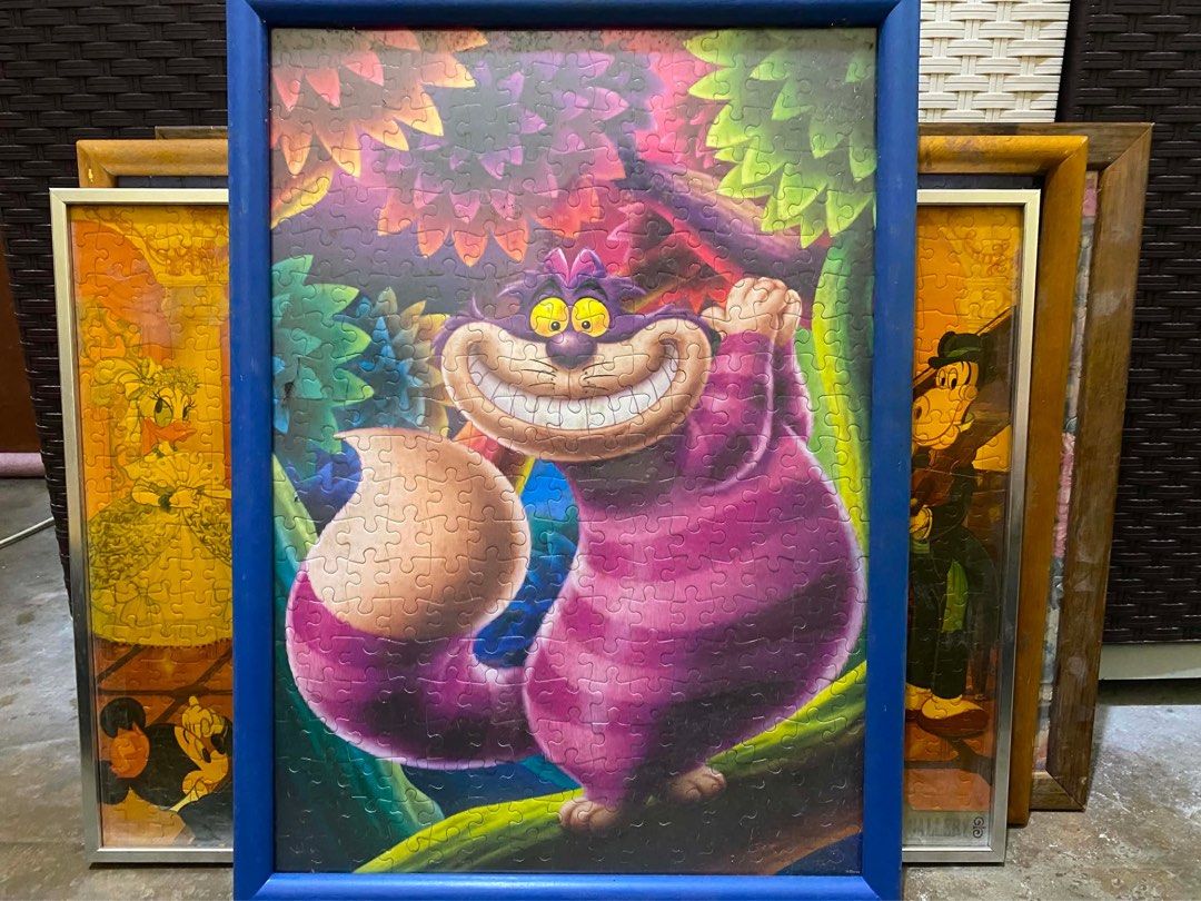 Cheshire Cat Framed Puzzle (Category: Board Games & Puzzles) located in Imus. Submitted by mnmv23 (Listing ID 1437393749, Image 1). Description: Cheshire (super gandaaaa huhuhu) With OG box pa po ito Size: approx 30.5cm x 43cm Frame has minimal scratches, puzzle is in good condition, has blue marks inside yung cover pero not affecting the actual image (barely noticeable).