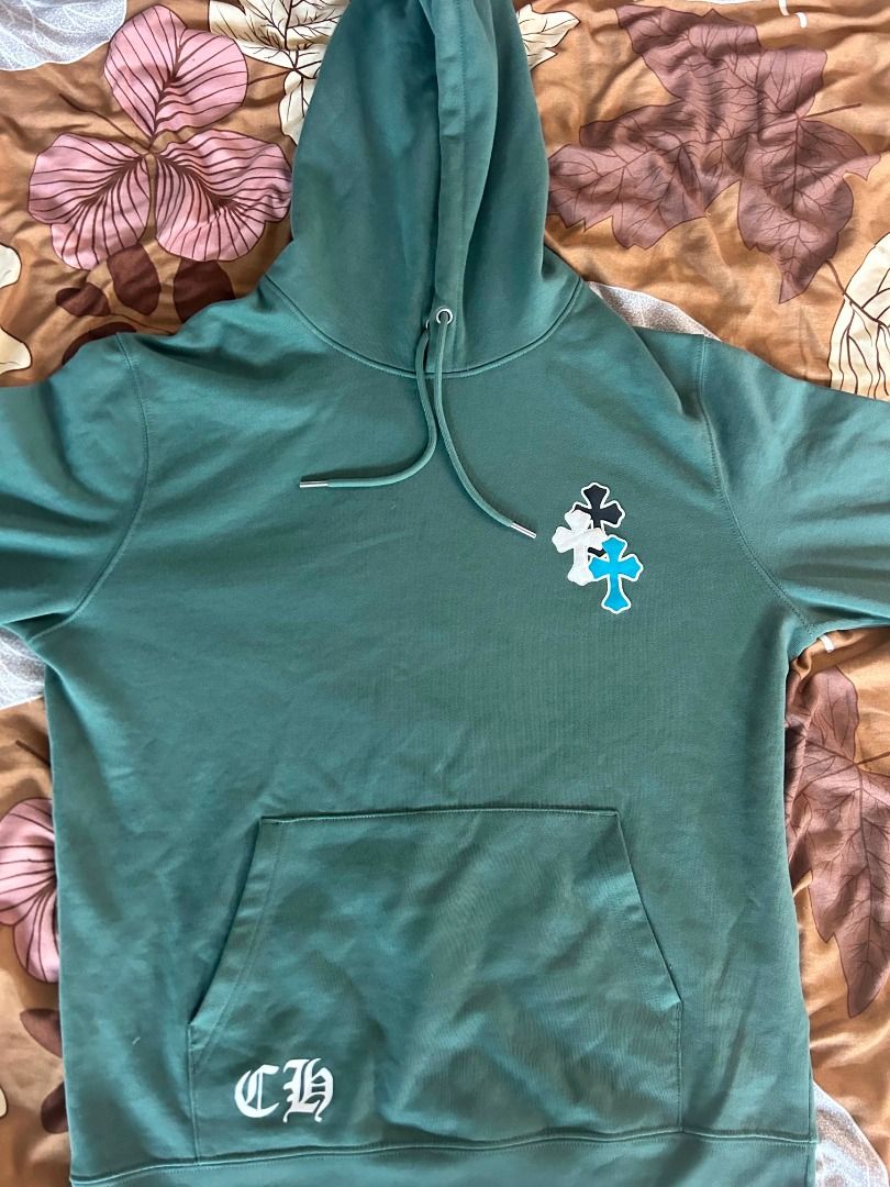 Chrome Hearts (Category: Coats, Jackets and Outerwear) located in Caloocan City. Submitted by ralphivanbunag (Listing ID 1437230673, Image 1). Description: CHROME HEARTS GREEN HOODIE • SIZE M 🟢 🔥 Premium Luxury Streetwear — Like New Condition! 🔥 ✅ Size: Medium (Relaxed fit) ✅ Material: 100% thick premium cotton — soft, comfy, & durable ✅ Details: Original logo + signature cross patches (blue/white/black) ✅ Color: Dark Green — sleek & easy to m