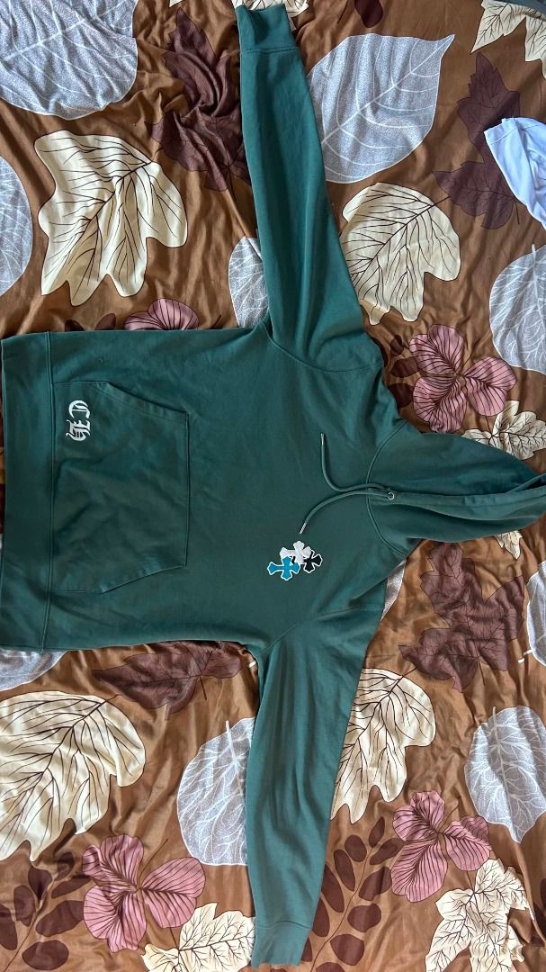 Chrome Hearts (Category: Coats, Jackets and Outerwear) located in Caloocan City. Submitted by ralphivanbunag (Listing ID 1437230673, Image 2). Description: CHROME HEARTS GREEN HOODIE • SIZE M 🟢 🔥 Premium Luxury Streetwear — Like New Condition! 🔥 ✅ Size: Medium (Relaxed fit) ✅ Material: 100% thick premium cotton — soft, comfy, & durable ✅ Details: Original logo + signature cross patches (blue/white/black) ✅ Color: Dark Green — sleek & easy to m